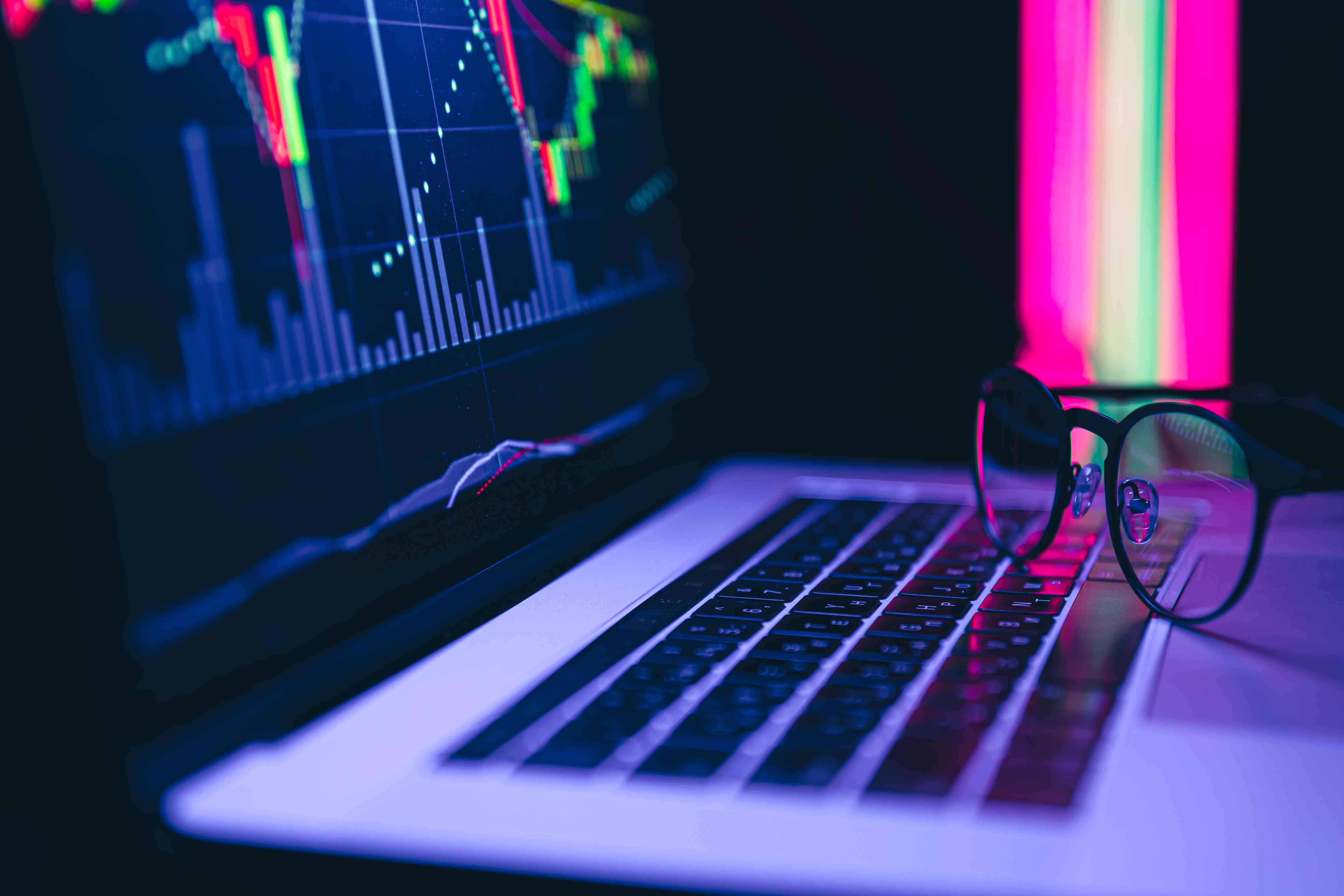 stock-market-graph-financial-data-electronic-board-laptop-screen_11zon